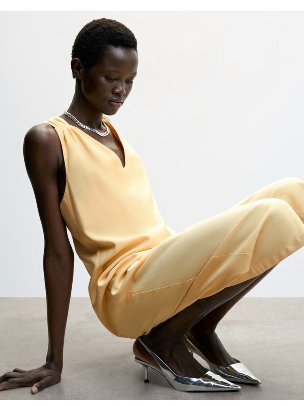 Mango Sleeveless V-Neck Jumpsuit in Soft Yellow